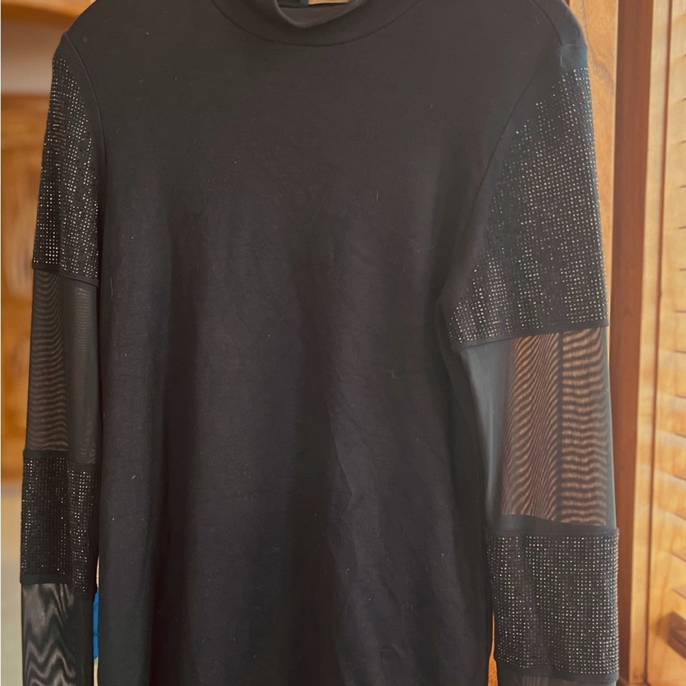 Jane & John by Tricotto. 100% Polyester. Mock turtleneck beaded/shear sleeves